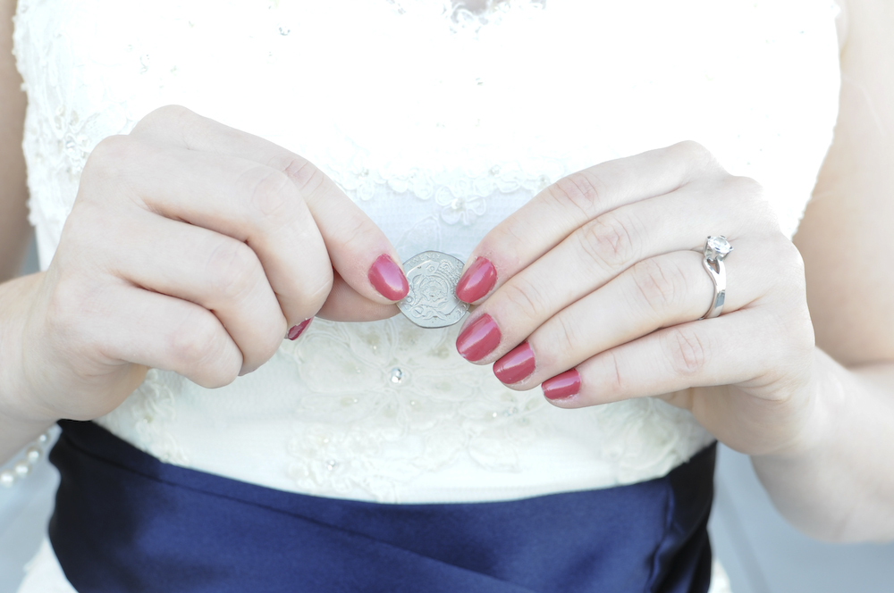 wedding ring with pink nails