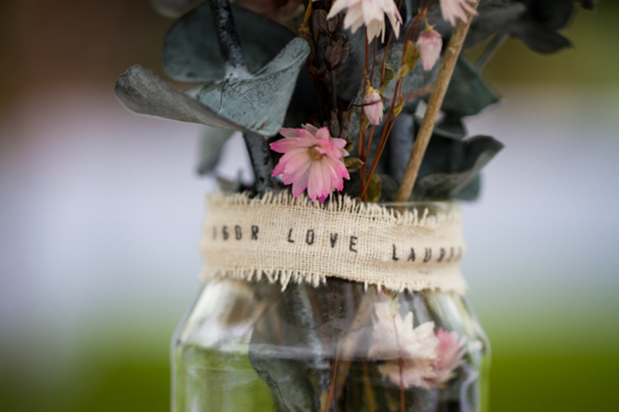 the printed burlap wrap around these glass jars is such a cute touch