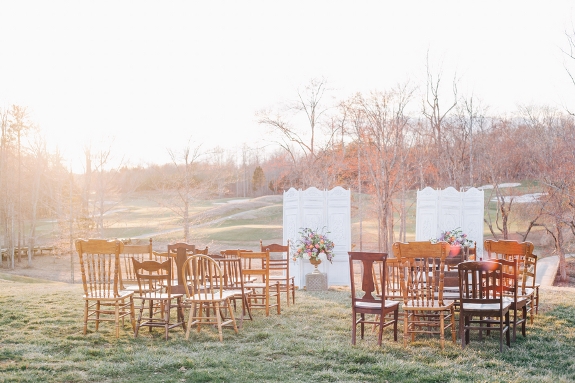 eclectic outdoor wedding ceremony setup