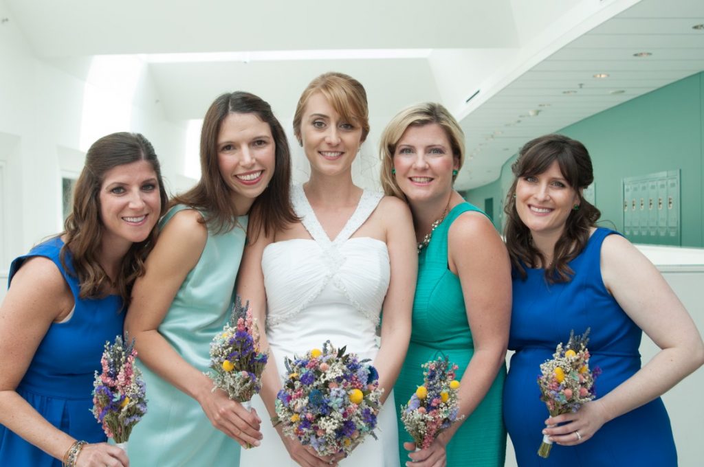 mismatched blue teal bridesmaids dresses