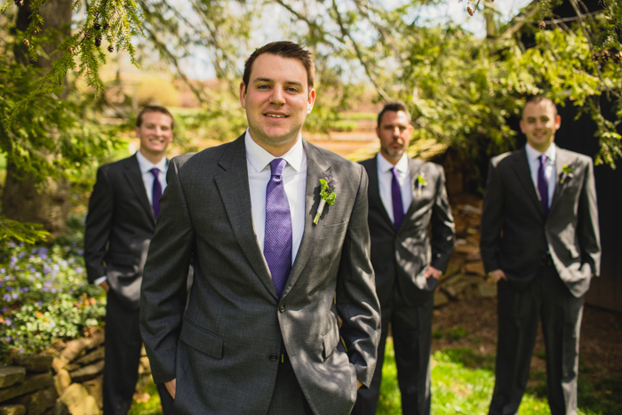 grey groomsmen suits purple ties